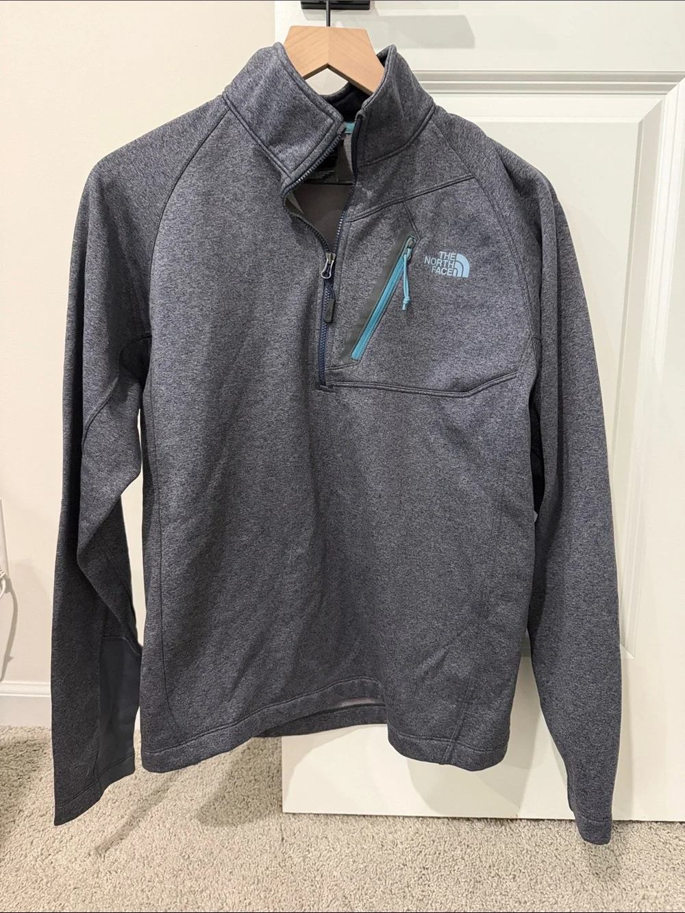 The North Face Unisex Quarter-Zip Pullover with Teal Accents